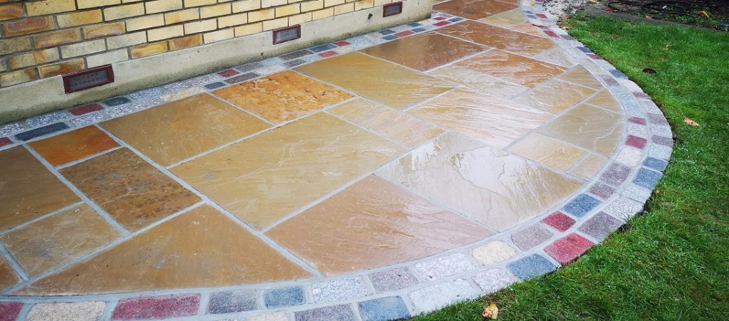 sandstone paving with granite edging